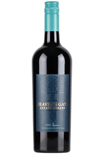 Bottle of 2018 Igneous Meritage with a blue label and teal top. 