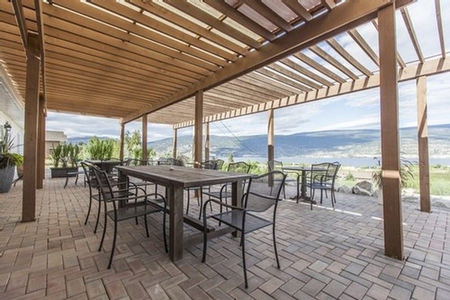 patio with table and chairs overlooking okanagan lake from Lunessence, one of our favourite Summerland wineries