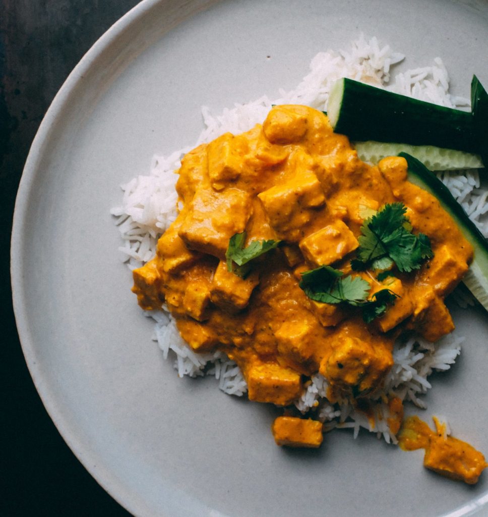 mango chicken with white rice, a great pairing for Gewurtztraminer wines